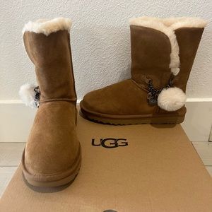 Ugg women’s classic short charm chestnut suede boots.